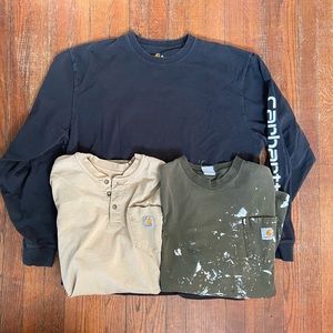 3 Carhartt XL shirts. 2 short sleeve and one long